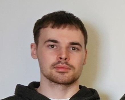 Člen tímu 1