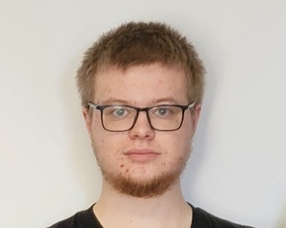 Člen tímu 2